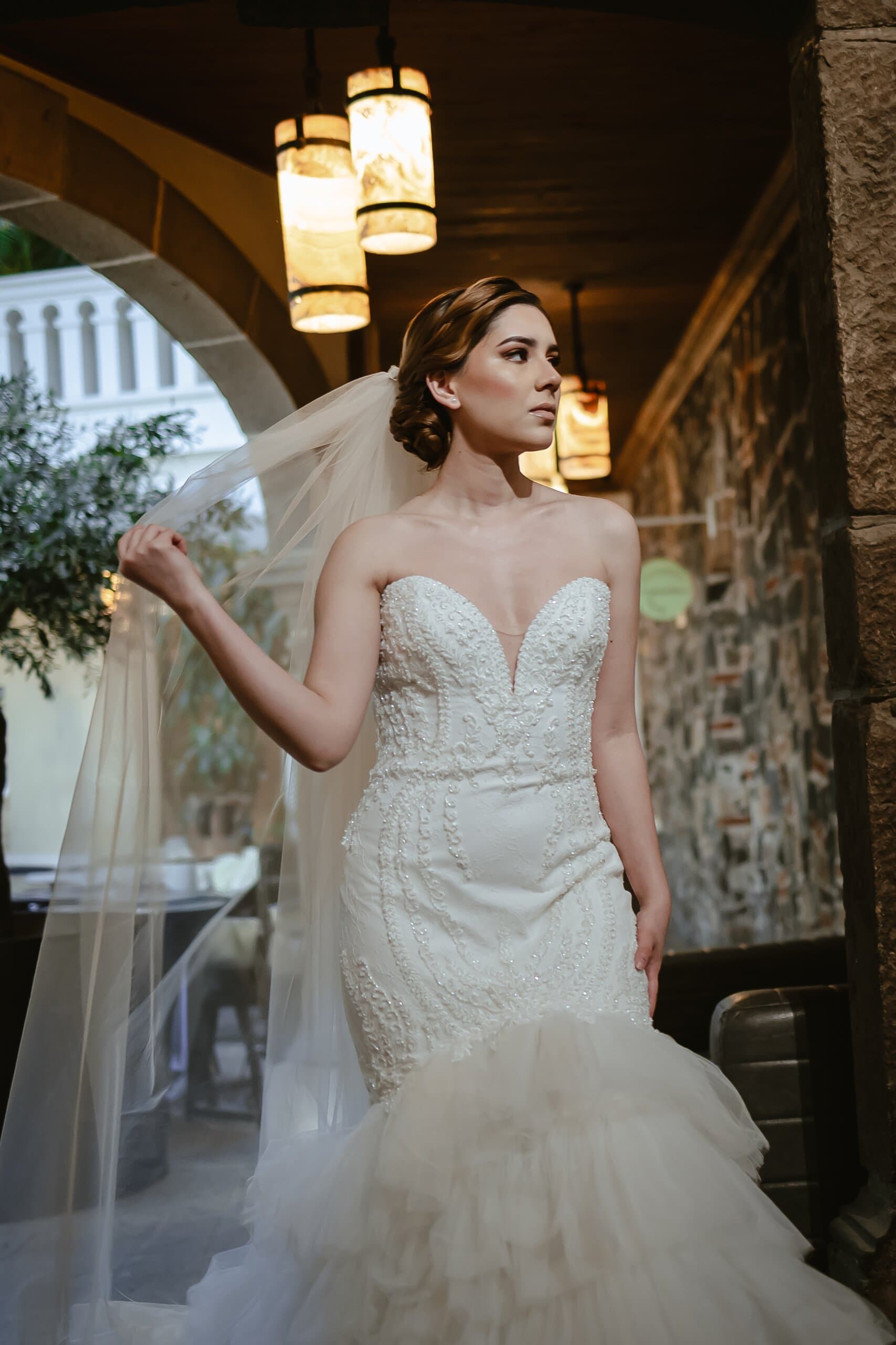 Bride at a destination wedding venue during a tour with Clhei