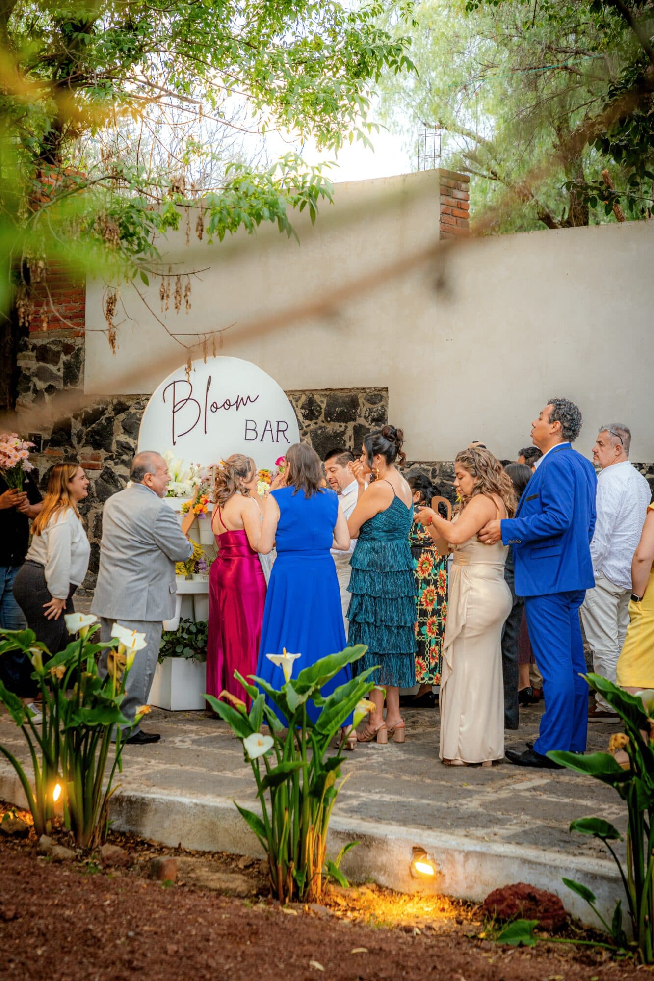 Guests building their bouquets at Clhei's Flower Bar during an event